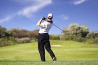 Photograph of Golfer Hitting Golf Ball